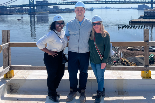 Happy employees on construction site - JAG Management Company Jefferson Apartment Group jobs