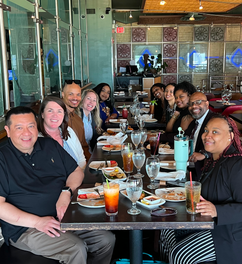 The Jefferson team enjoying a lunch together - JAG Management Company Jefferson Apartment Group property manager jobs
